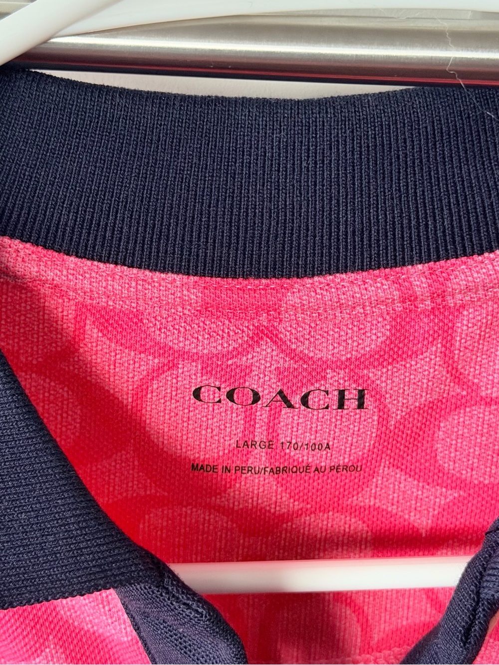 Coach women Pink Polo with Navy Trim and Signature Print - Picture 2 of 6